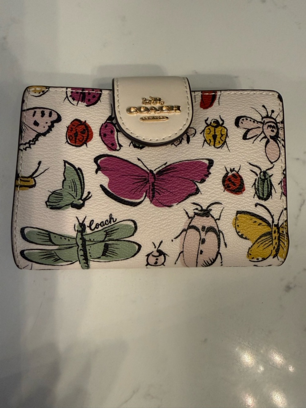Coach Cream Leather Wallet with Pink, Yellow & Green Bug Creature Print